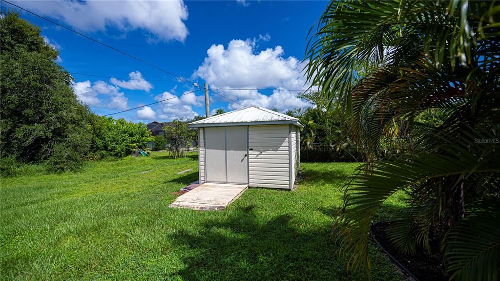 Convenient storage shed.