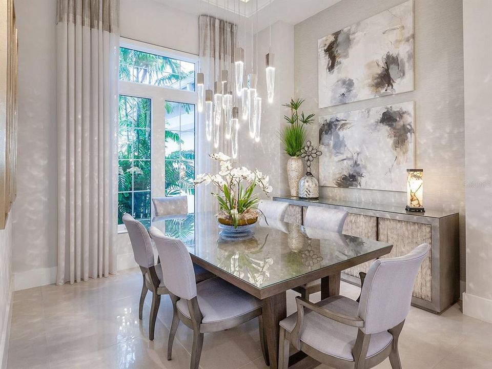 Dining room with crystal chandelier centerpiece