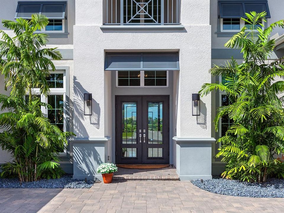 Custom impact glass and iron front doors