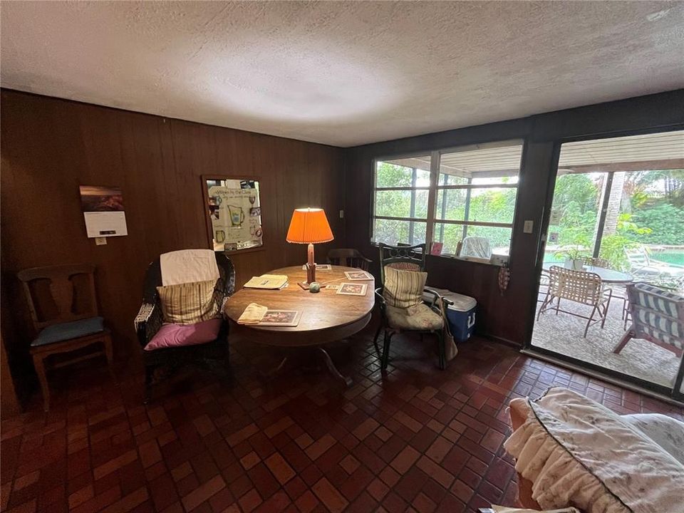 Dining Nook open to Family Room and Porch