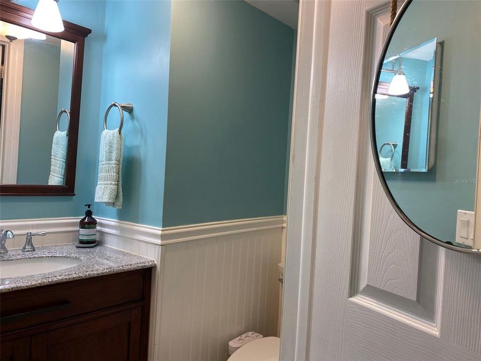 Master Half bathroom behind the tall dresser