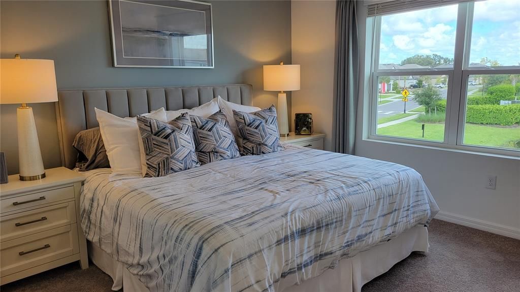 bright and cheerful main bedroom