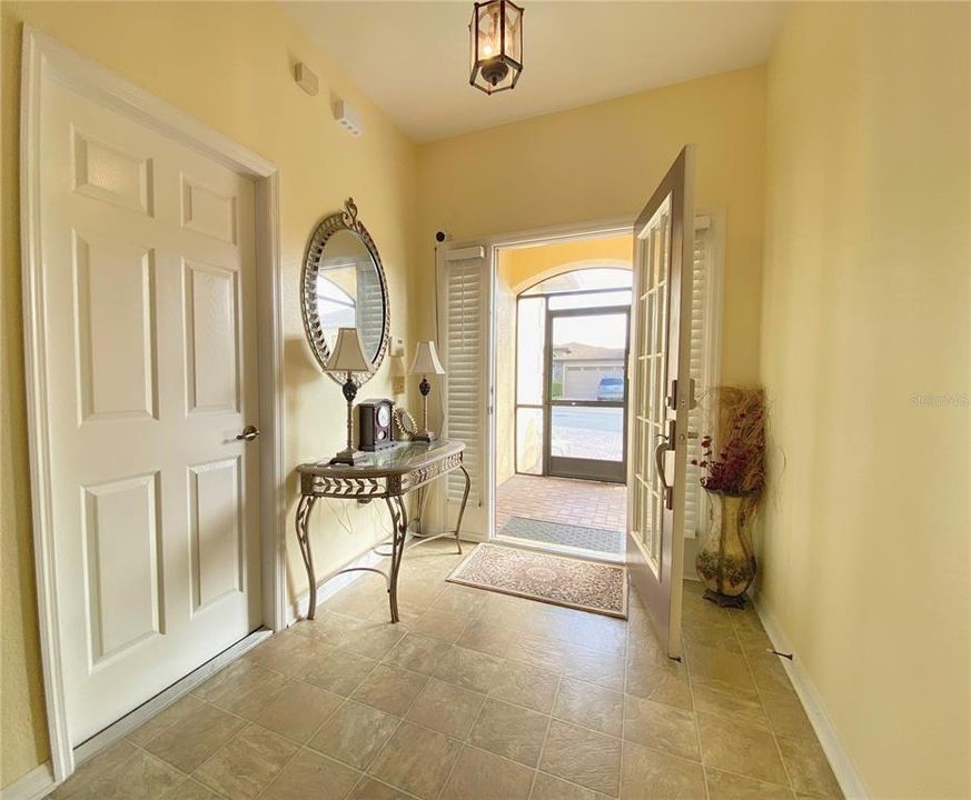 Front Door to Home and Door to Double Garage Door Entry