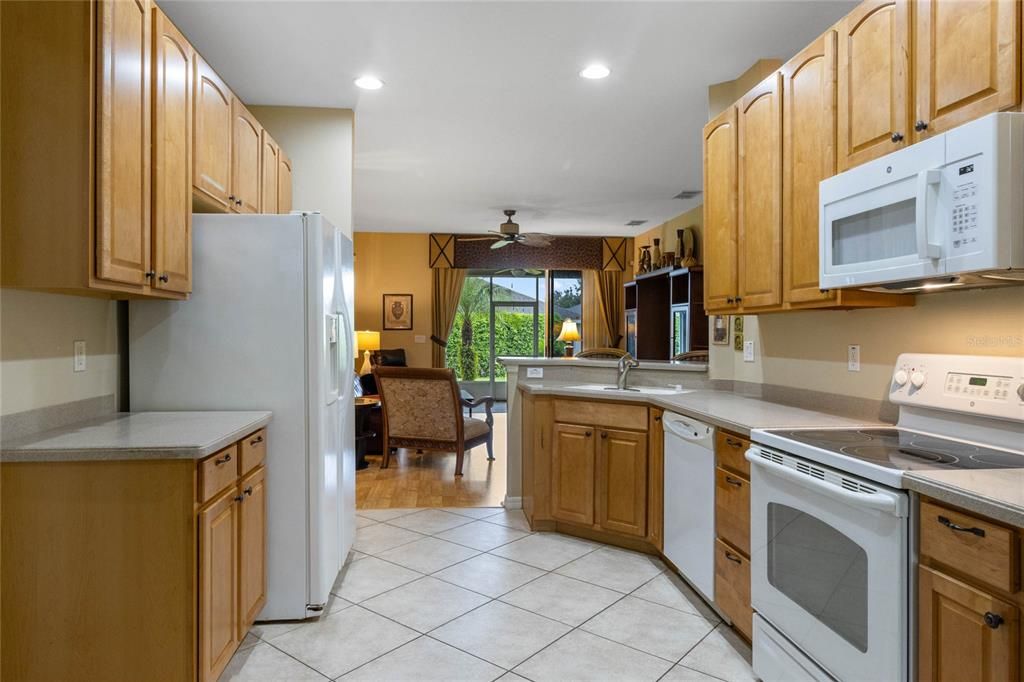 Kitchen features 42" Upper Cabinetry with Bronze Hardware