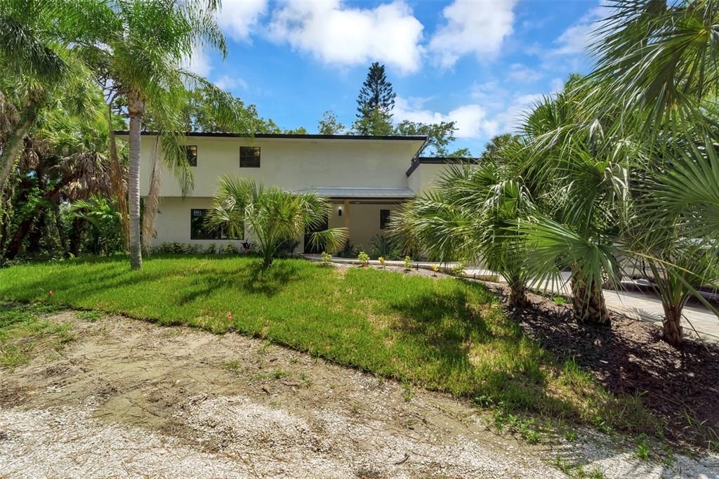 Front of home from street.  Sits back on lot for additional privacy.  Circle driv