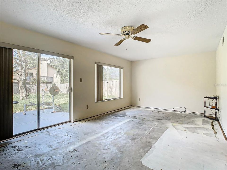 The family room takes you through the sliding glass doors to the patio.