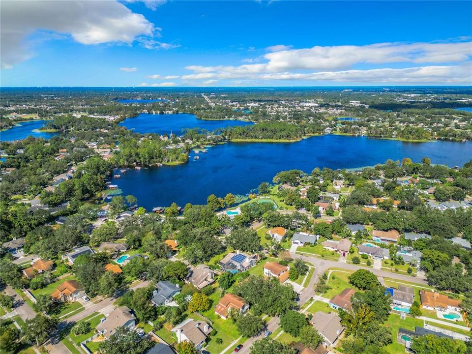 Aerial view showing the community has lake access to Lake Pearl.