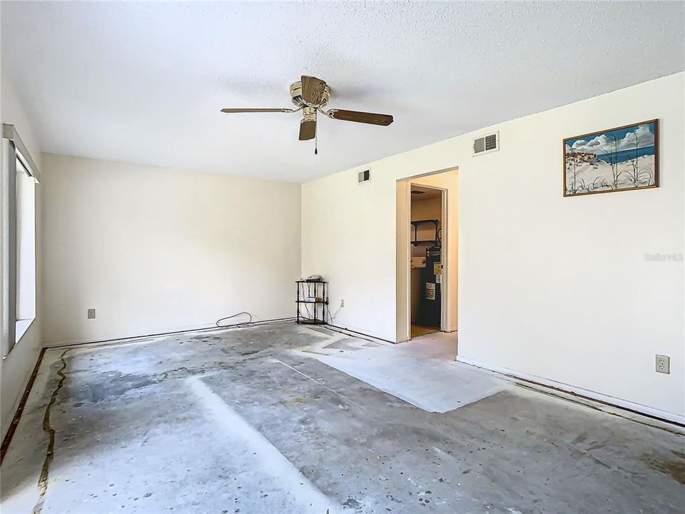 This view shows the view of the family room taking you to the laundry room and half bath.