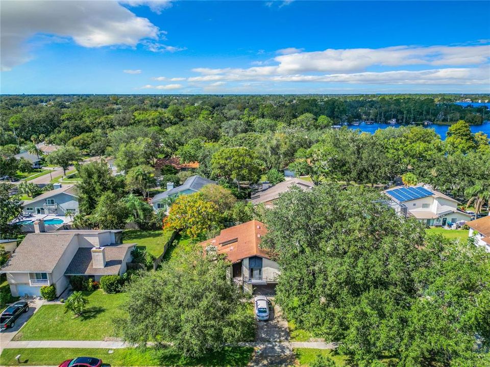 Beautiful trees give shaded landscaping to the lot which is almost a quarter acre.