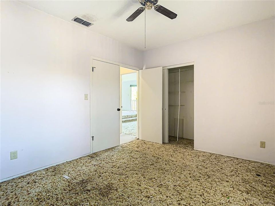 The guest bedroom next to the primary bedroom.