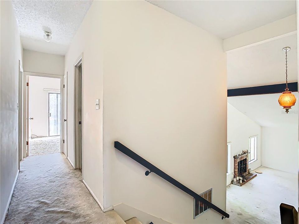 Looking down the hallway to the guest bedrooms.