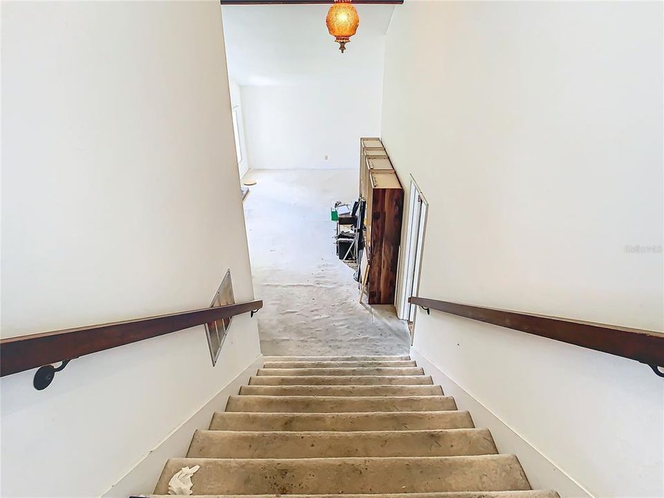 Looking to the living room from the top of the staircase.