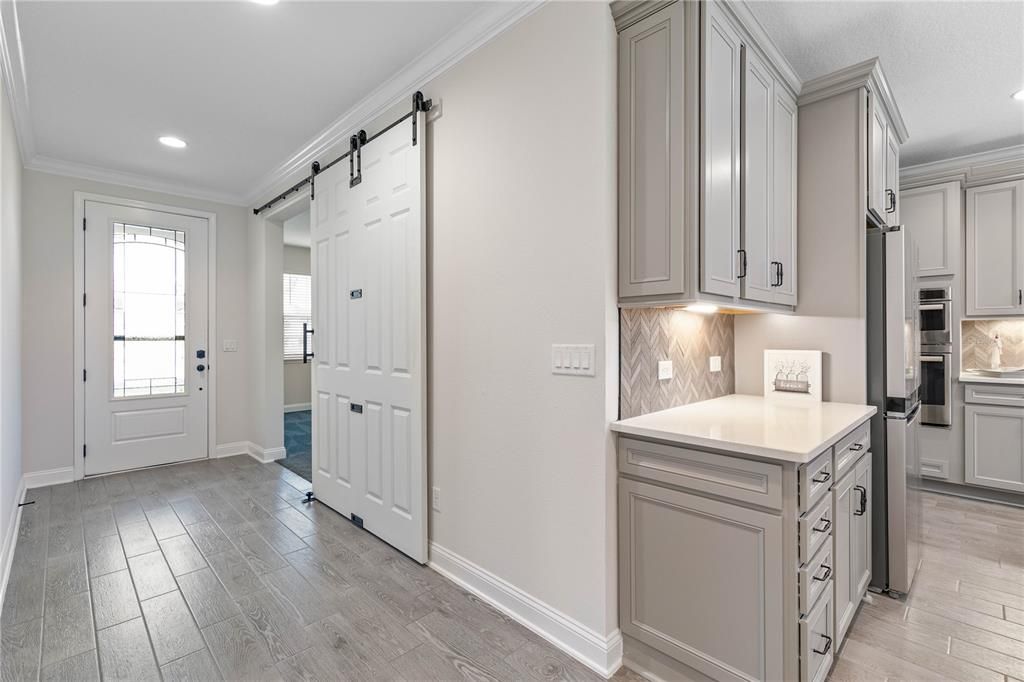 Inside entry with Barn sliding door to Flex Room