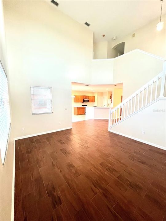 Vaulted ceiling in family room overseeing the serene pond.