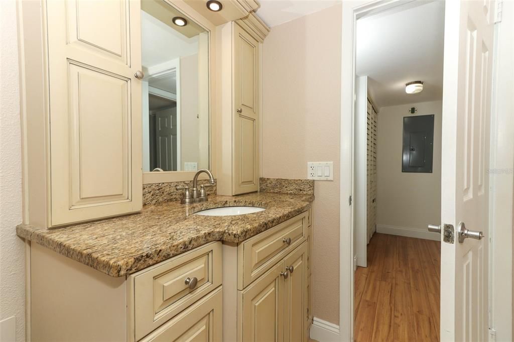 Solid wood cabinetry with granite top