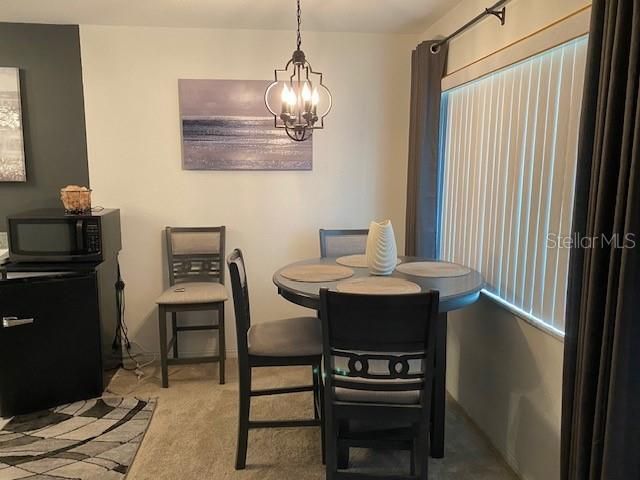 BAR AND SITTING AREA MASTER BEDROOM