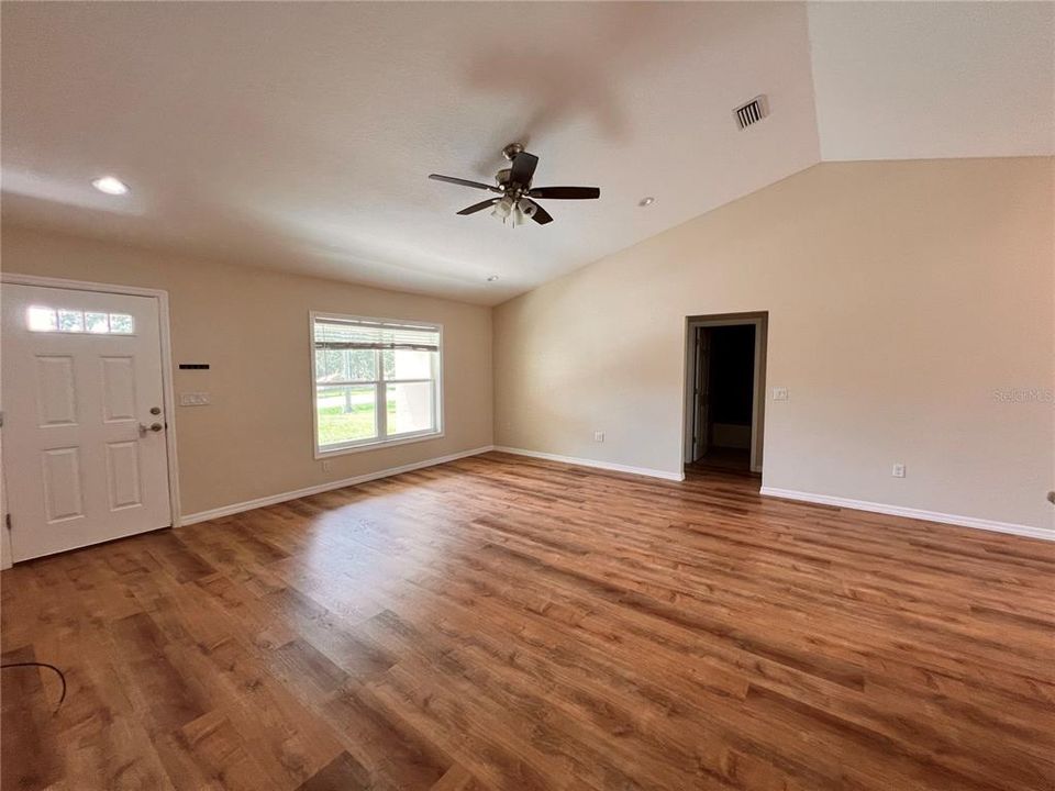 anther walkthrough the living room to guest bedrooms