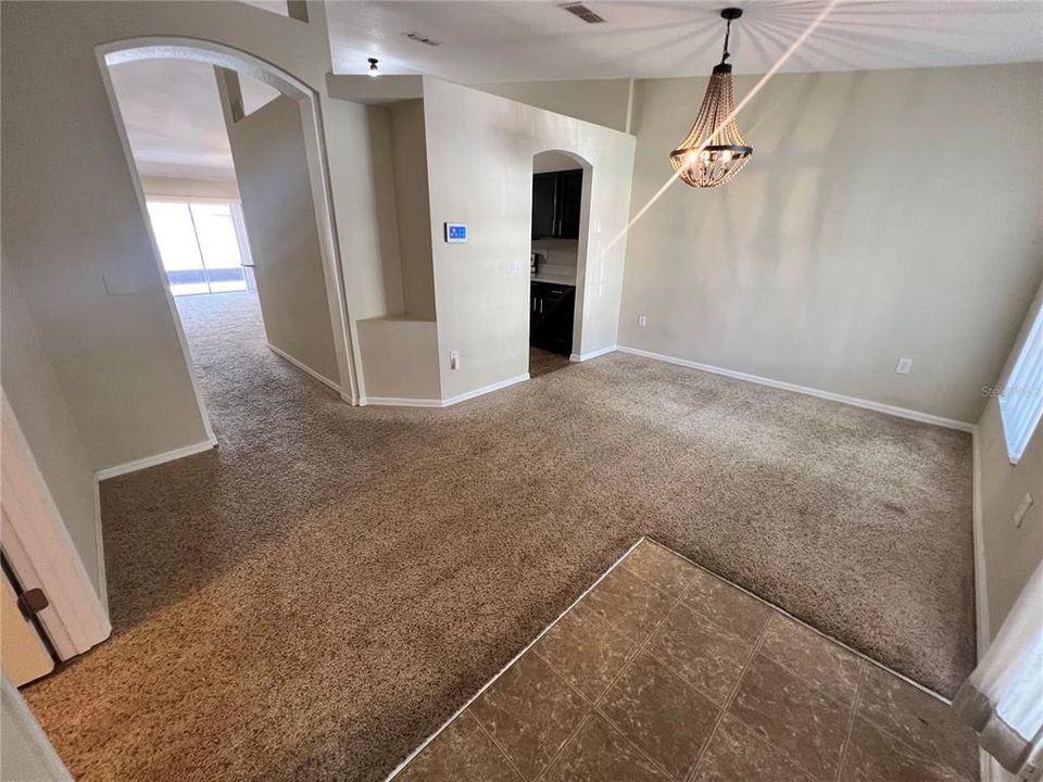 From the entrance, Bedroom 2 on the left and Dining area on the right.