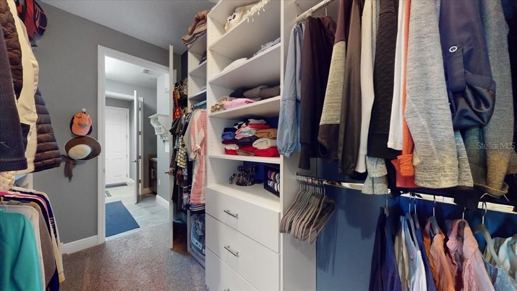 Custom Closets from Master Bedroom leads to Laundry Room