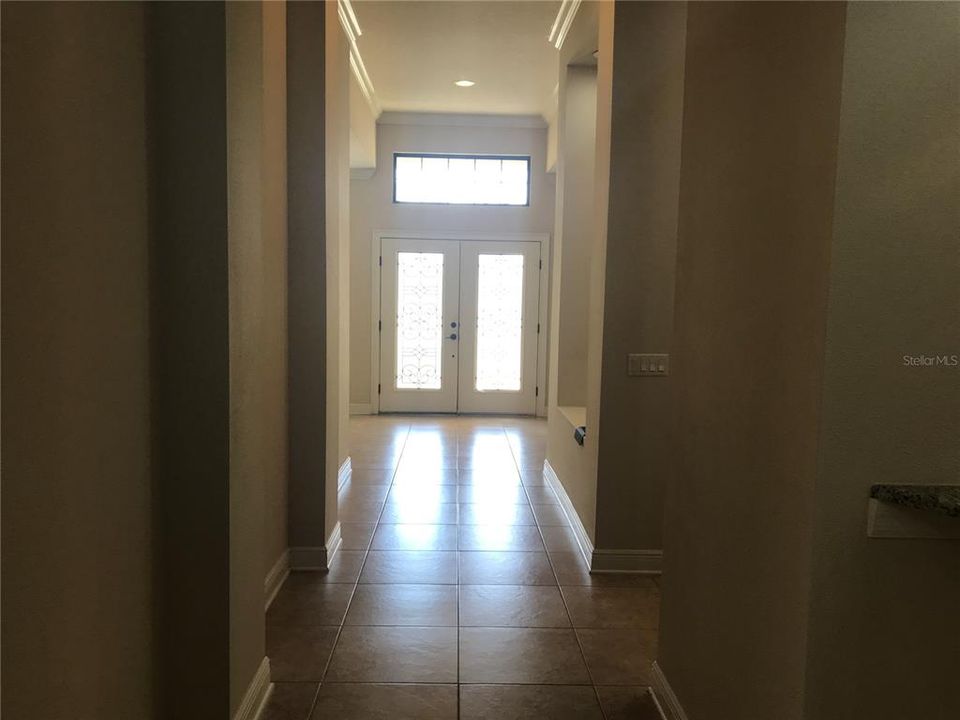 WIDE Entry Hallway showing Double Glass Doors - Crown Molding