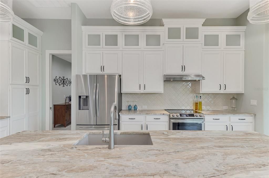 Fantasy brown granite countertops with a matte leather-like finish.