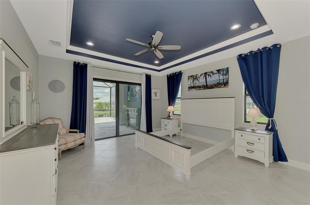 Large master bedroom with sliders to the lanai.