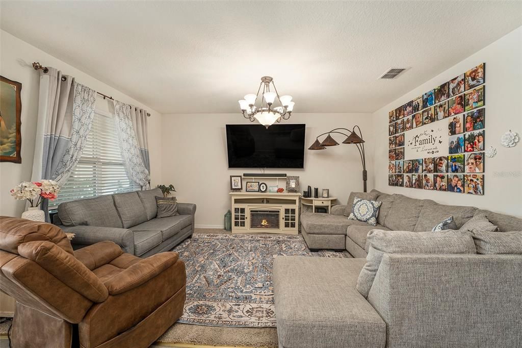 This living room boasts of relaxation!  Perfect for family gatherings!