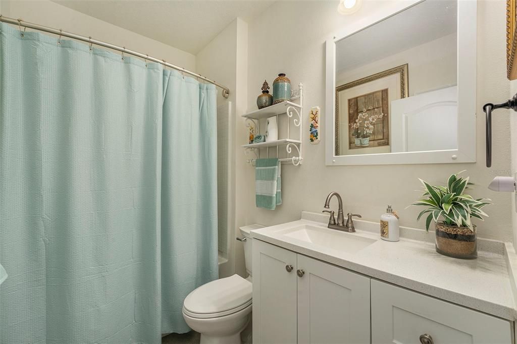 Guest bathroom is between Bedroom #2 and #3 (not a Jack n Jill bath)