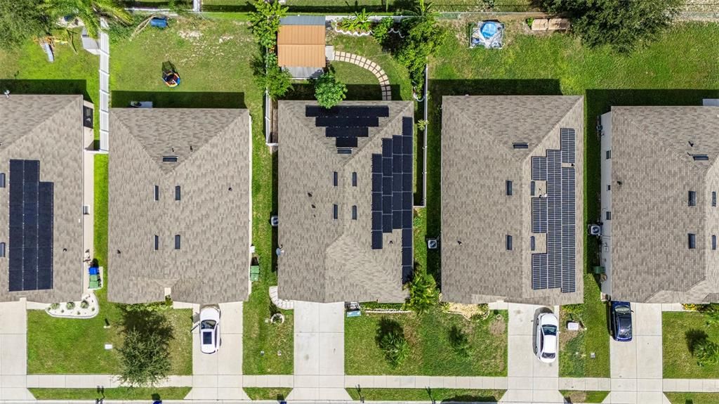 Aerial view of home and solar panels