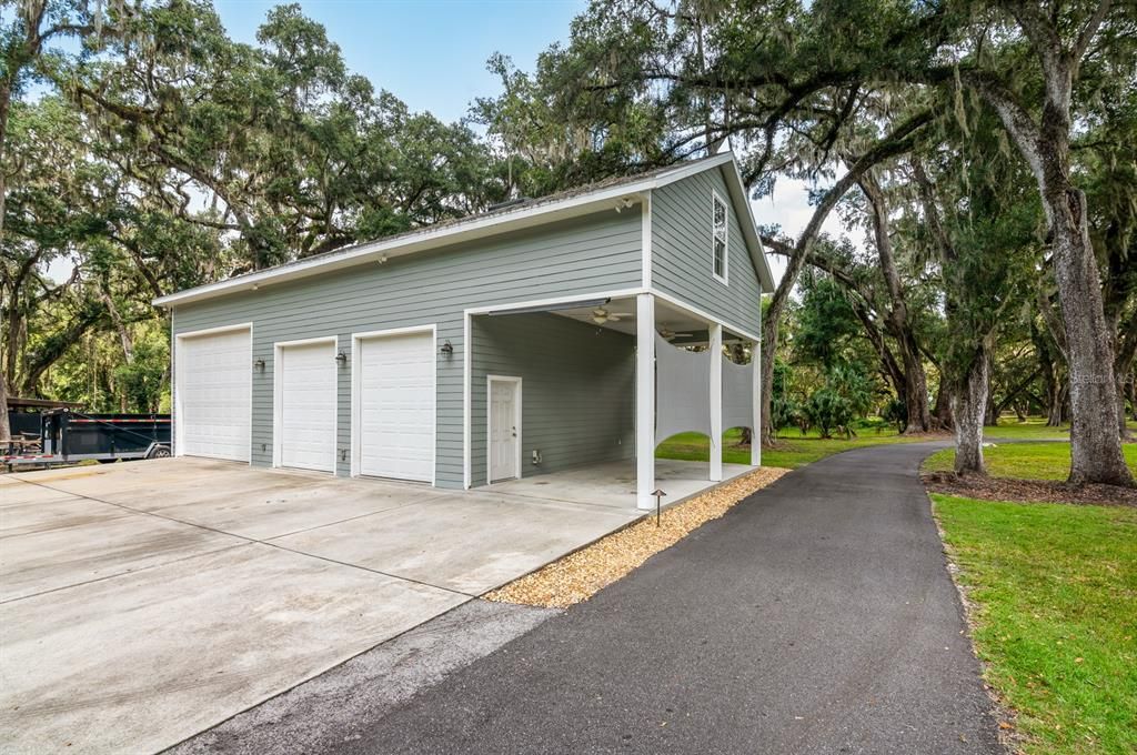 Detached garage w/RV parking AND Bonus BR/BA above