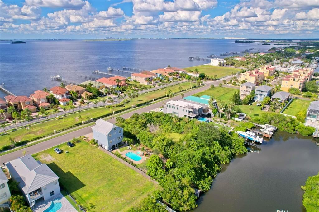 Aerial view of Tampa Bay to the west and canal to the east with access to waterfront dining, marina and Bay/Gulf.  Enjoy a quick boat ride to Beer Can Island or ride out 15-30 minutes across the Bay to Tampa or St Pete.