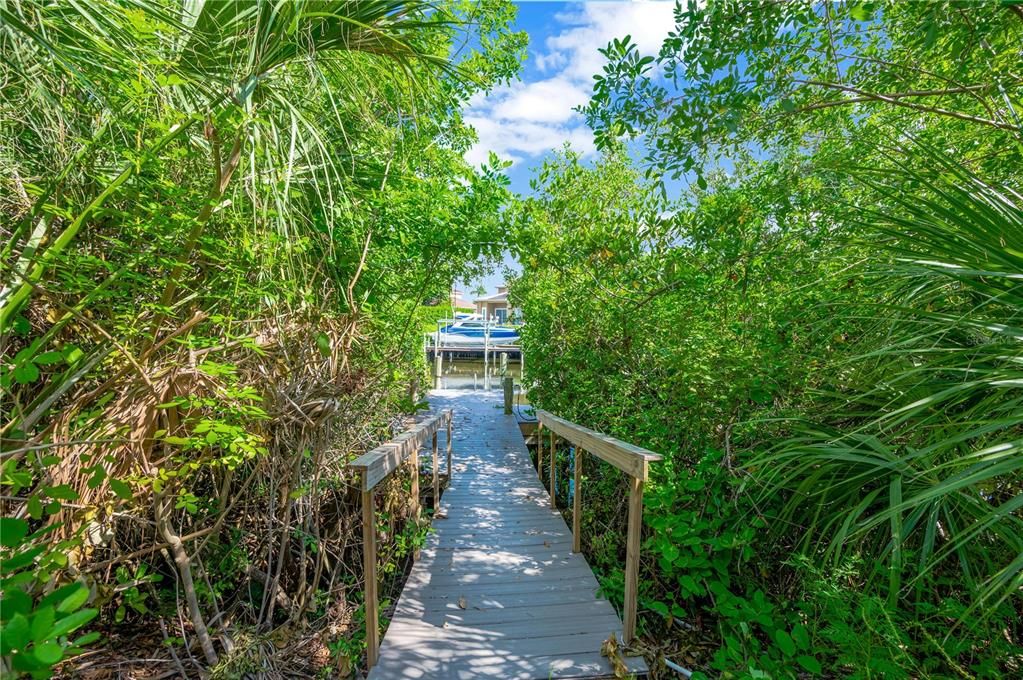 Grab your kayaks and hit the water through your private dock access.