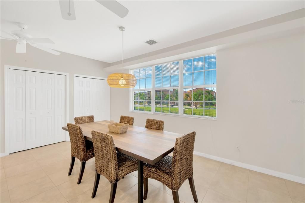 Dining room with ample space for 8-12 guests and a double panty for storage.