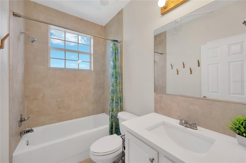 Full bathroom located on 3rd floor is shared by 3 secondary bedrooms.