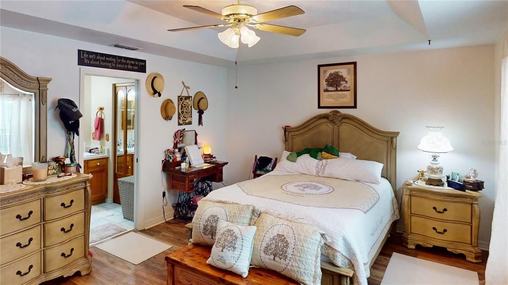 Primary Bedroom with Tray CeilingRetreat to the primary bedroom, featuring a sophisticated tray ceiling that adds height and elegance to the room. The spacious walk-in closet provides ample storage, helping to keep your sanctuary organized and clutter-free.