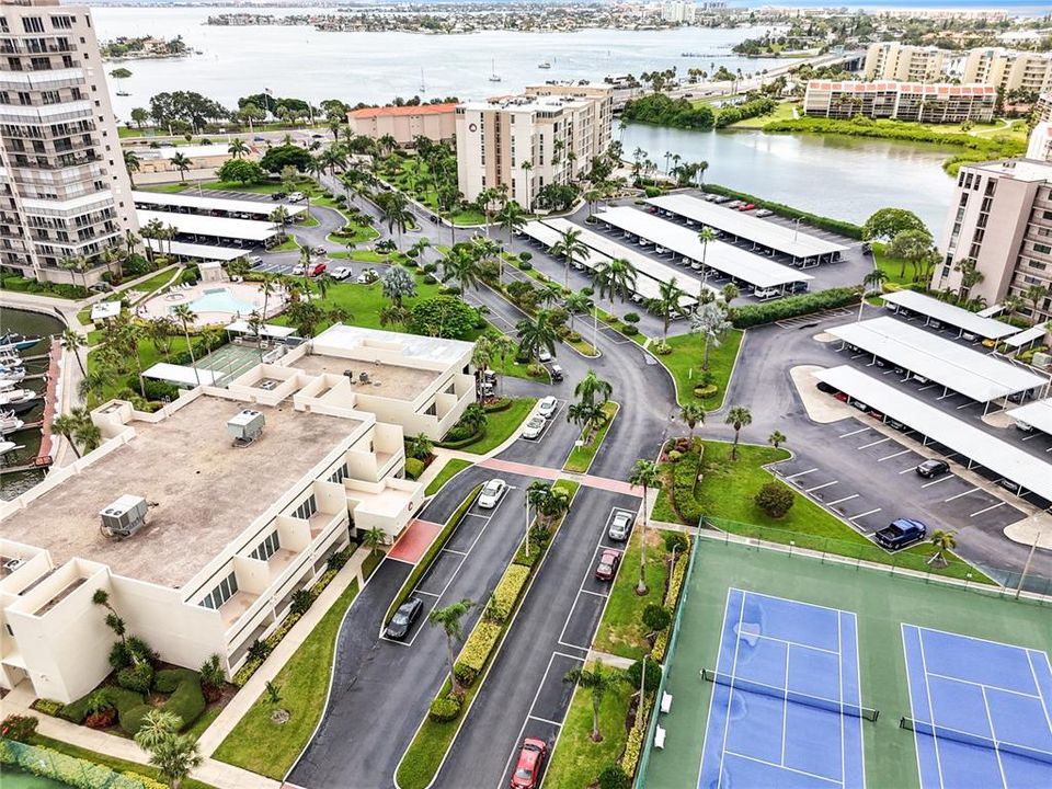 This aerial view shows the Ambassador building on the right and the carports for the building in front.