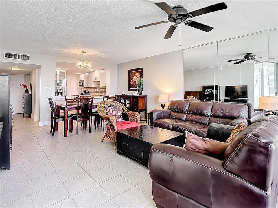 Another view of you living area that reflects the ample space you have for entertaining.  Don't forget that this unit is being sold completely furnished.