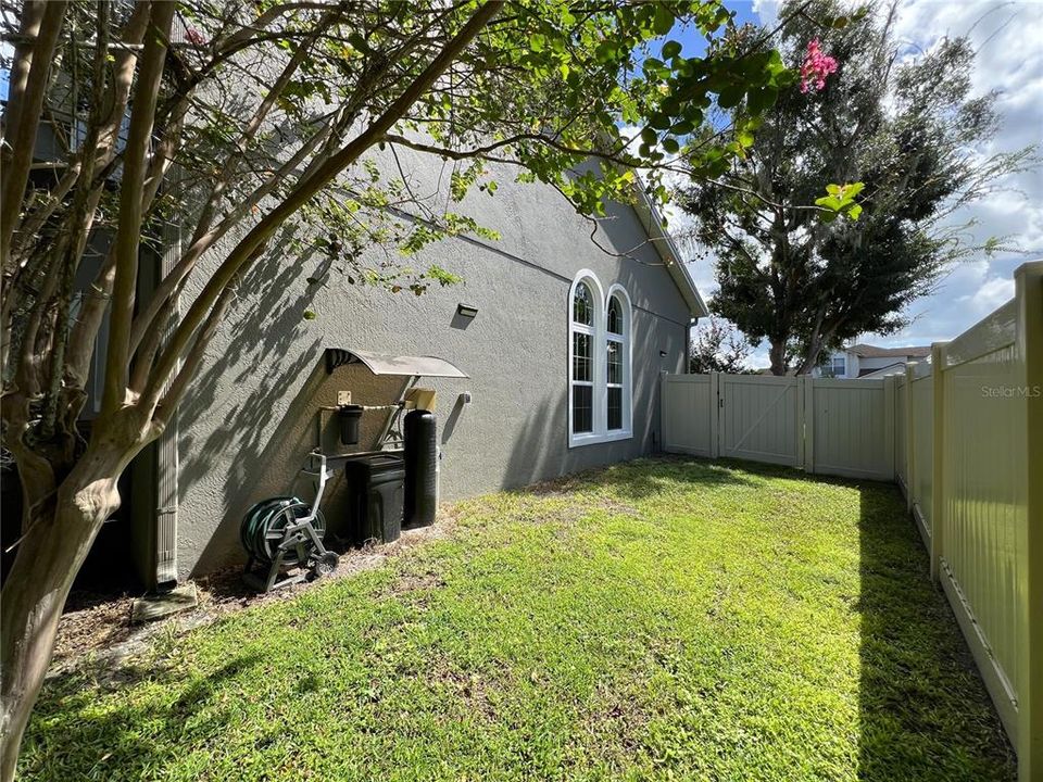 South side of house with water filter/softener