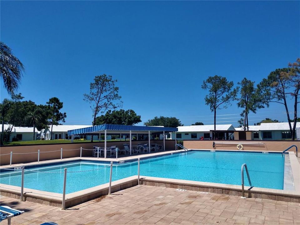 Relax poolside basking in the sun or sitting in the shade...either way enjoy the beautiful crystal-clear pool socializing, exercising or just chilling after a long day.