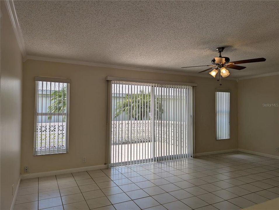 Wall of windows in Florida room provides great natural light and ventilation.