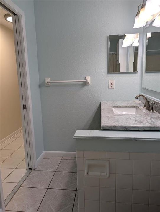 View from bathtub into hallway.