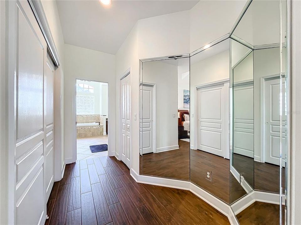 Primary bedroom dressing area, 2 large walk-in closets