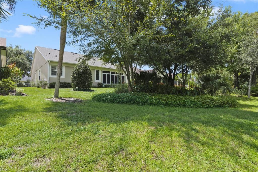 View of the rear of the home from the neighborhood common area behind home