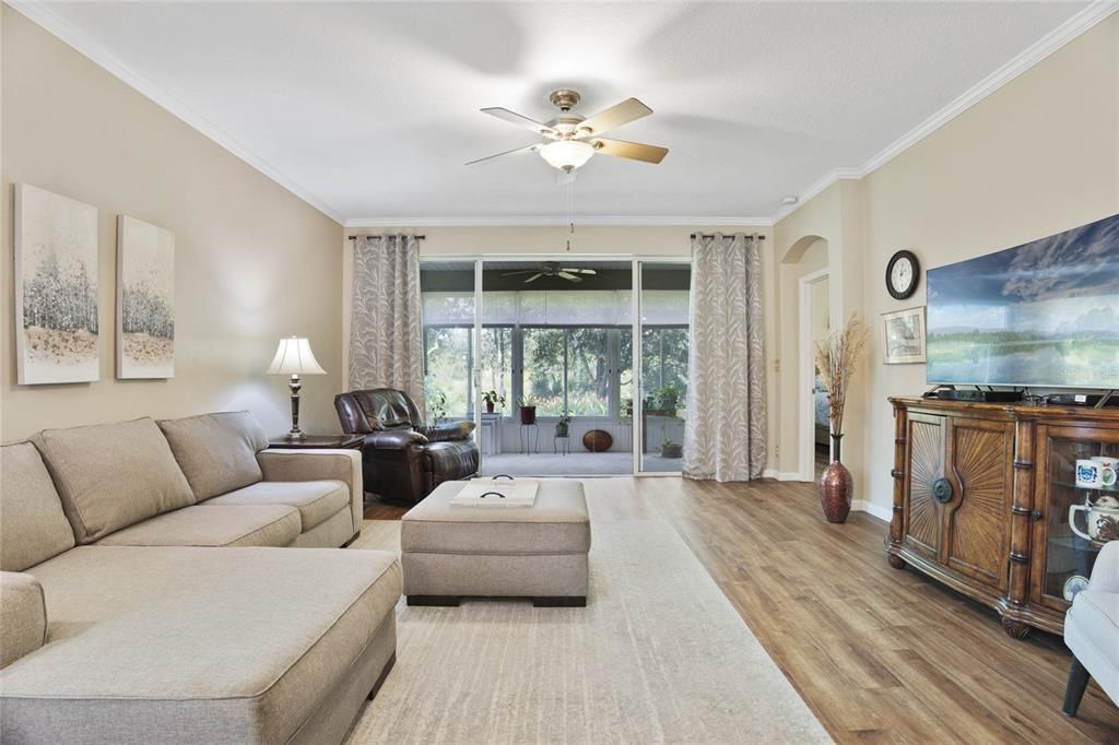 View of Great Room & the 16' x 8'6" air-conditioned enclosed lanai w/ sliding acrylic windows