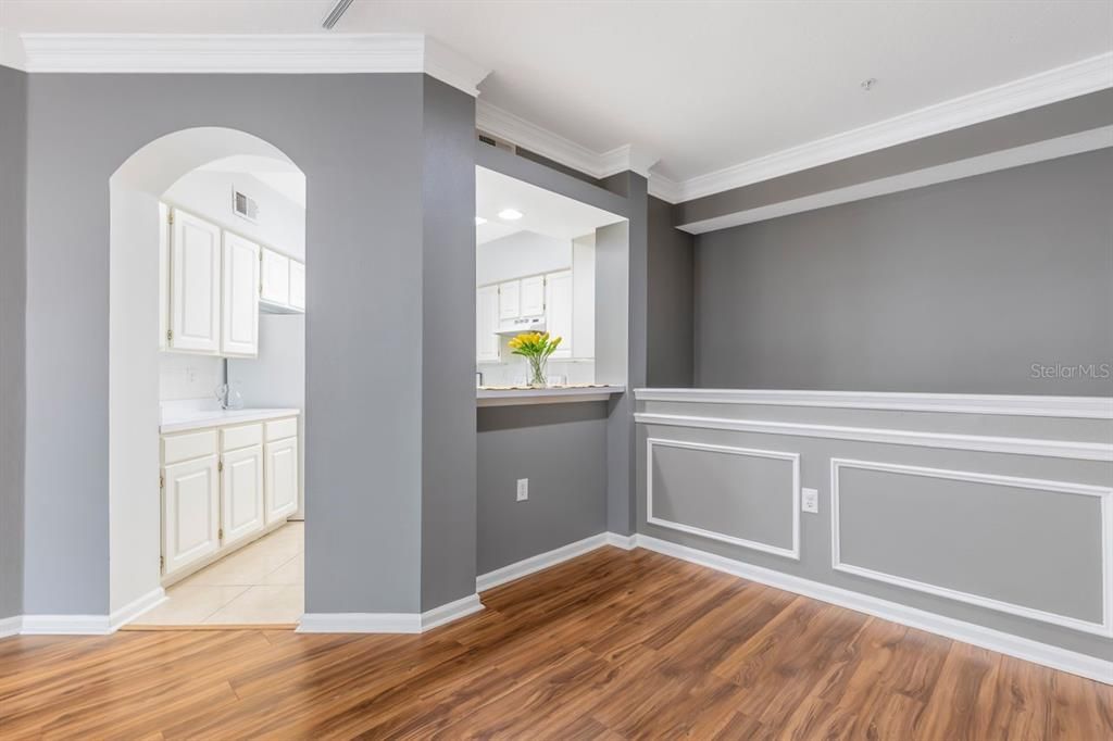 Primary bedroom with built-in shelving and walk-in closet