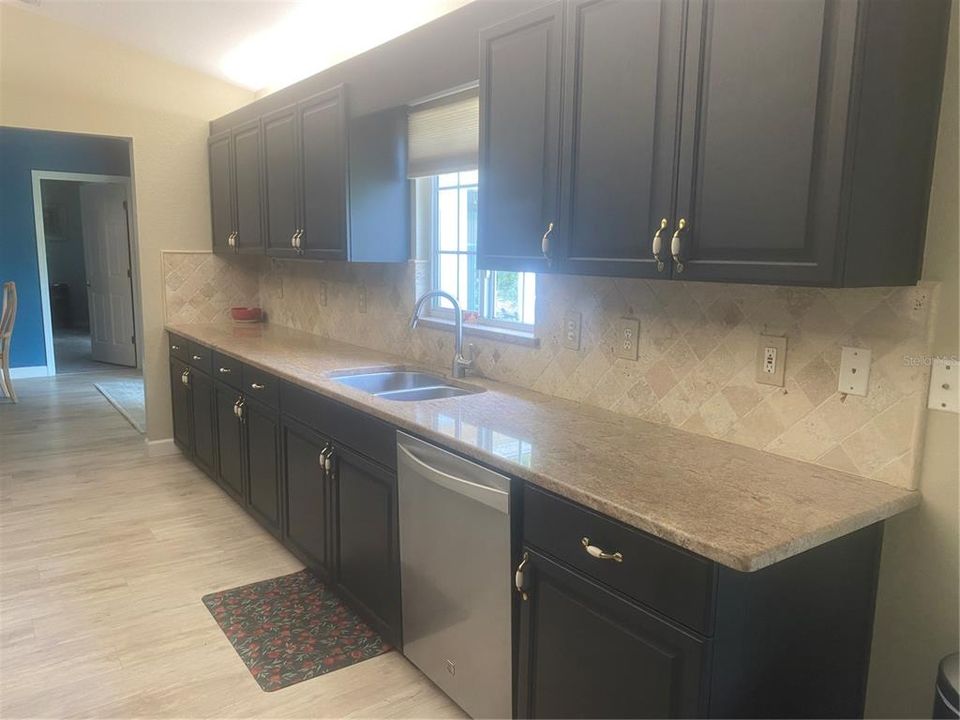 Travertine Tiled Backsplash.