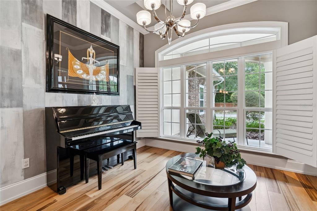 Music room, formal dining room, reading room...your choice! Plantation shutters