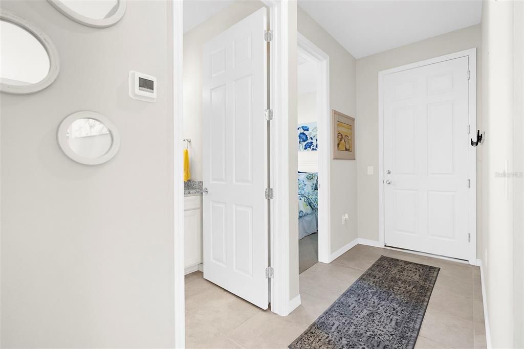 Hallway to guest bath/bed and door to garage