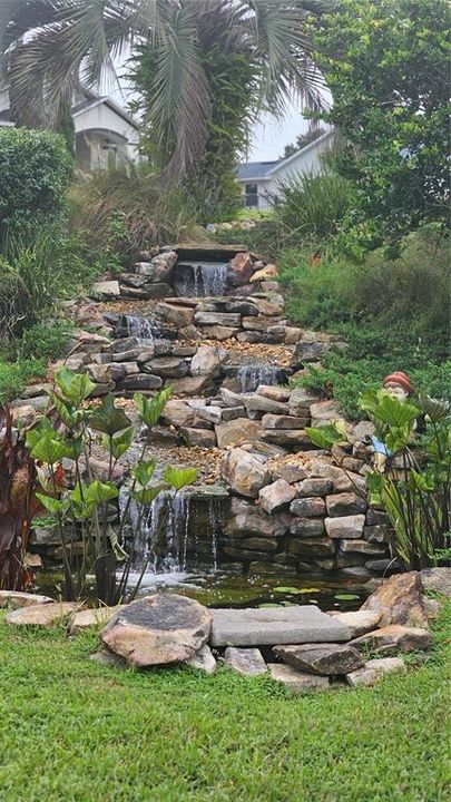 Lovely waterfall and fish pond