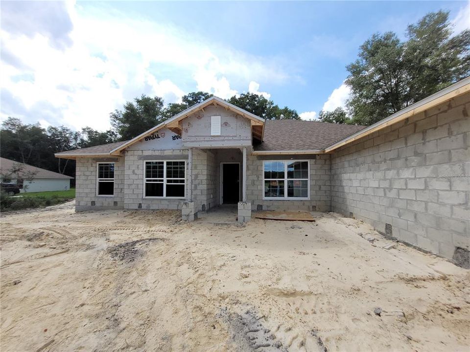 2557 sq ft model Craftsman Elevation.  These are side entry garages.